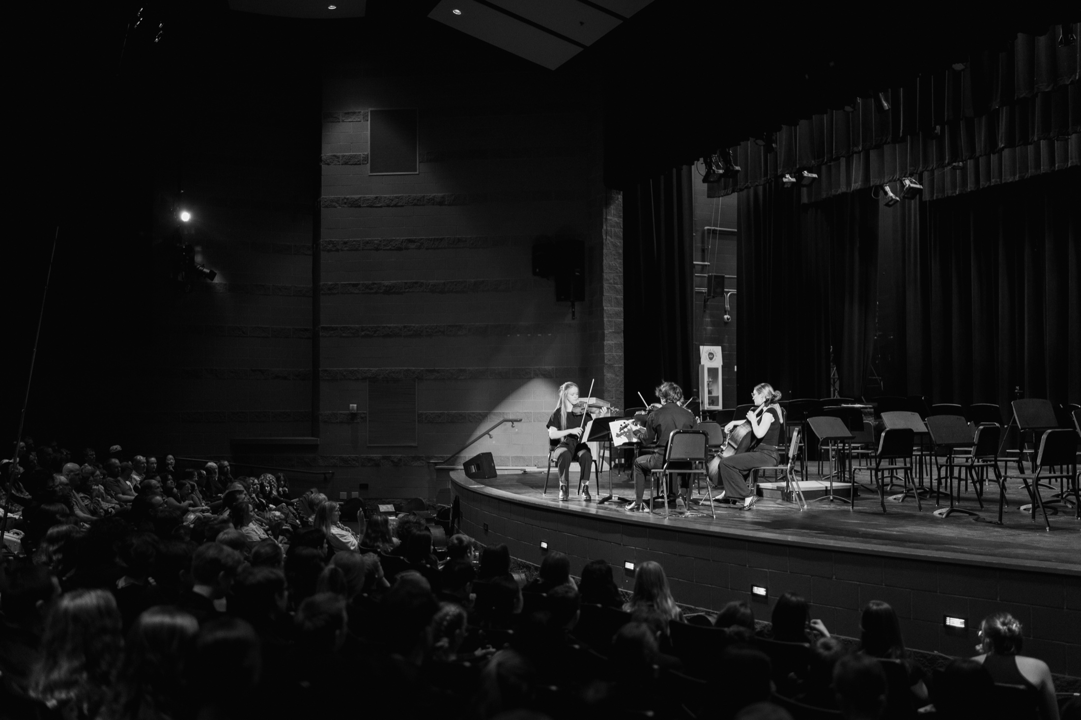 NoCoYO chamber musicians performing on stage for an audience